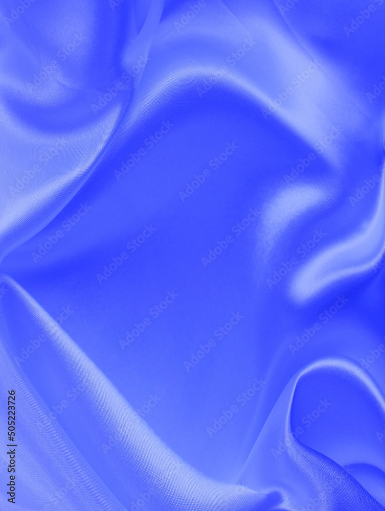 Blue silk material with pleats. Blue silk material with pleats.
