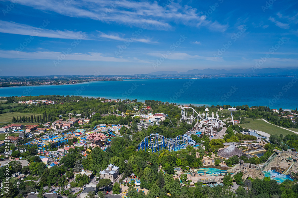 Panorama of Lake Garda, Italy. Aerial view of an amusement park, Lake Garda Italy. Amusement park Gardaland, Italy. Extreme entertainment garda. Panorama at high altitude. Panorama of Lake Garda, Italy. Aerial view of an amusement park, Lake Garda Italy. Amusement park Gardaland, Italy. Extreme entertainment garda. Panorama at high altitude.