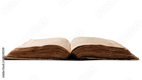 Single old worn jewish book. Open pages of Torah isolated on white background. Closeup. Selective focus. photo