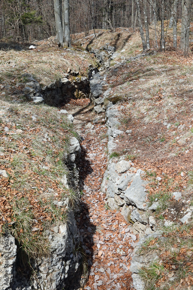 war trench dug into the rock by soldiers to defend against enemy attacks war trench dug into the rock by soldiers to defend against enemy attacks