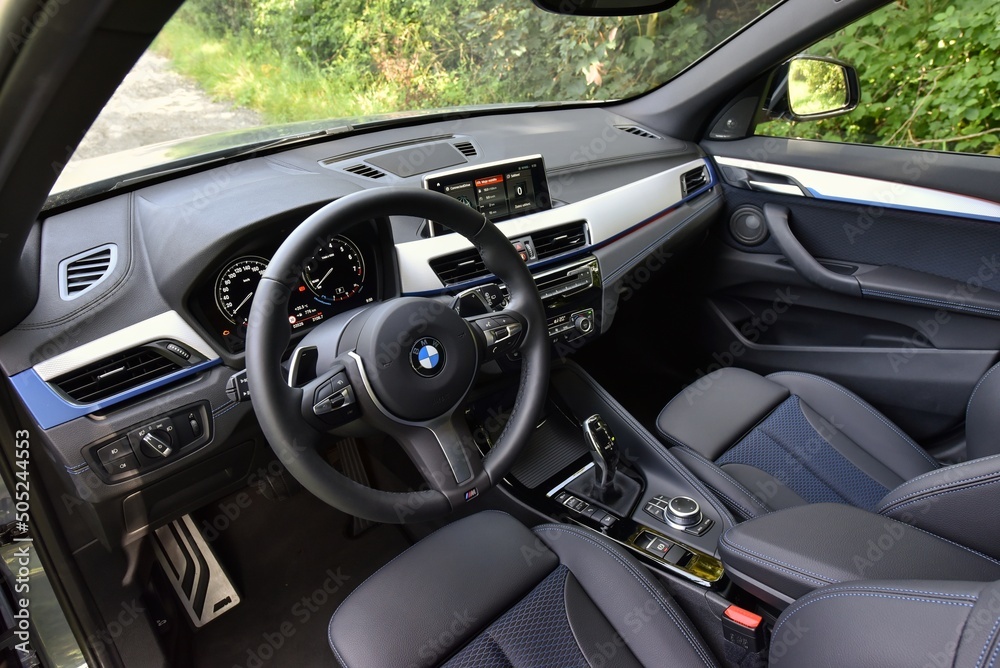 BMW X1 25i xDrive. Cabin interior - dashboard. 08-10-2021, Prague, Czech  Republic. Photos | Adobe Stock
