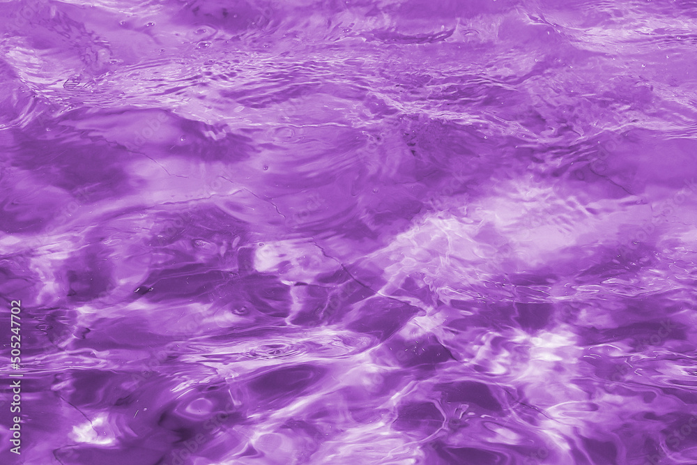 Texture or background. Purple  mini wave on the ocean or sea.