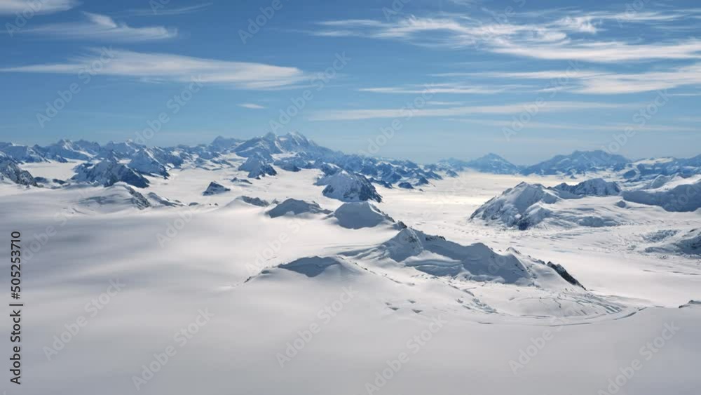 Panoramic aerial view of Saint Elias ice field and snow-capped mountain ranges Panoramic aerial view of Saint Elias ice field and snow-capped mountain ranges