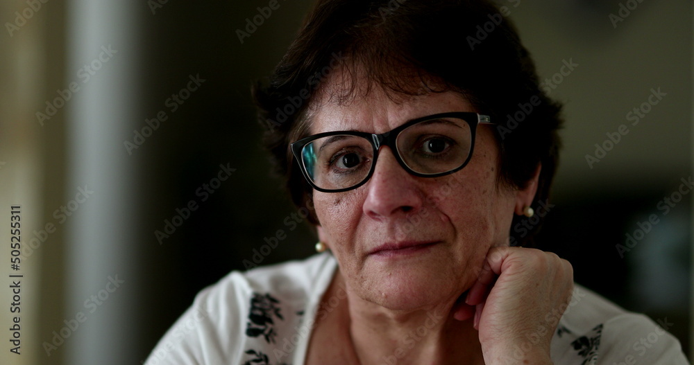Portrait casual middle aged woman looking at camera Portrait casual middle aged woman looking at camera