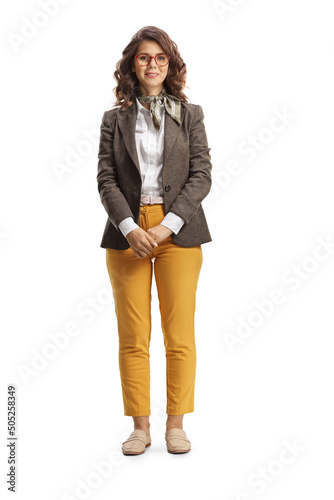 Full length portrait of a young woman with glasses wearing casual work clothes
