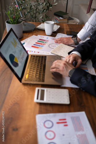 Businessman working on Financial Report of corporate operations, balance