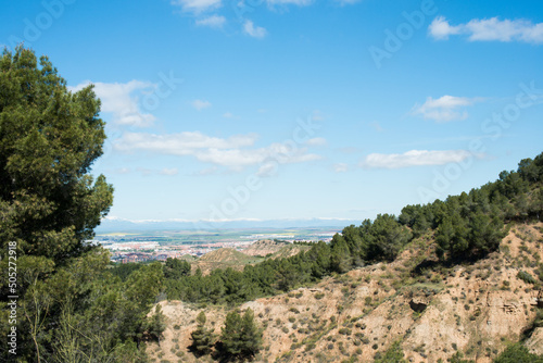 Trekking at Los Cerros Park in springtime. Beautiful view of Alcala de Henares. Madrid.