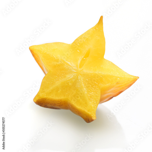 Carambola, star fruit slice on background 