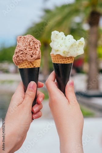 Woman hands holding gelato ice cream