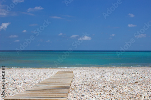 Beautiful Spanish coast and sea in Albir near Alikante, Spain,print for postcard,wallpaper,cover design,poster ,calendar,advertising,brochure,summer sunny day,weekend on the beach. photo