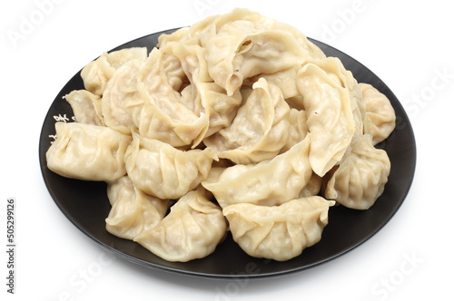 Chinese dumplings on white background