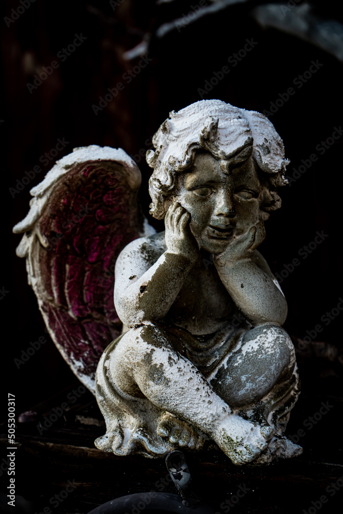 angel statue in the darkness