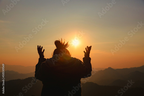 woman worship on sunset