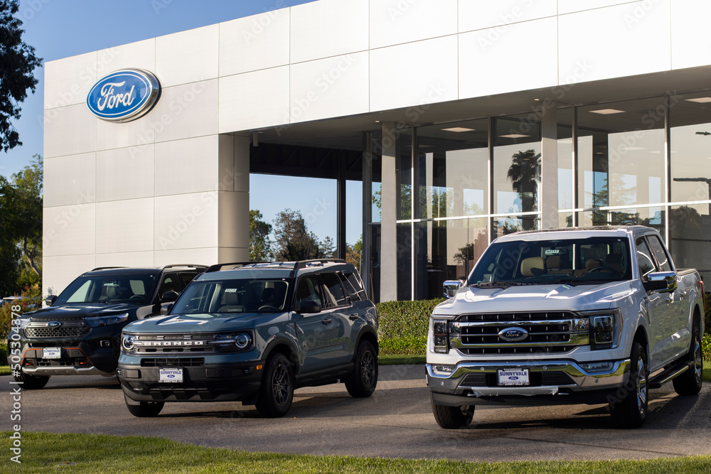 Sunnyvale, CA, USA May 3, 2022 Ford pickup trucks and SUVs are seen displayed outside a Ford