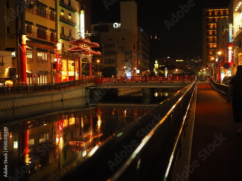 Road in front of Nagasaki Chinatown at night