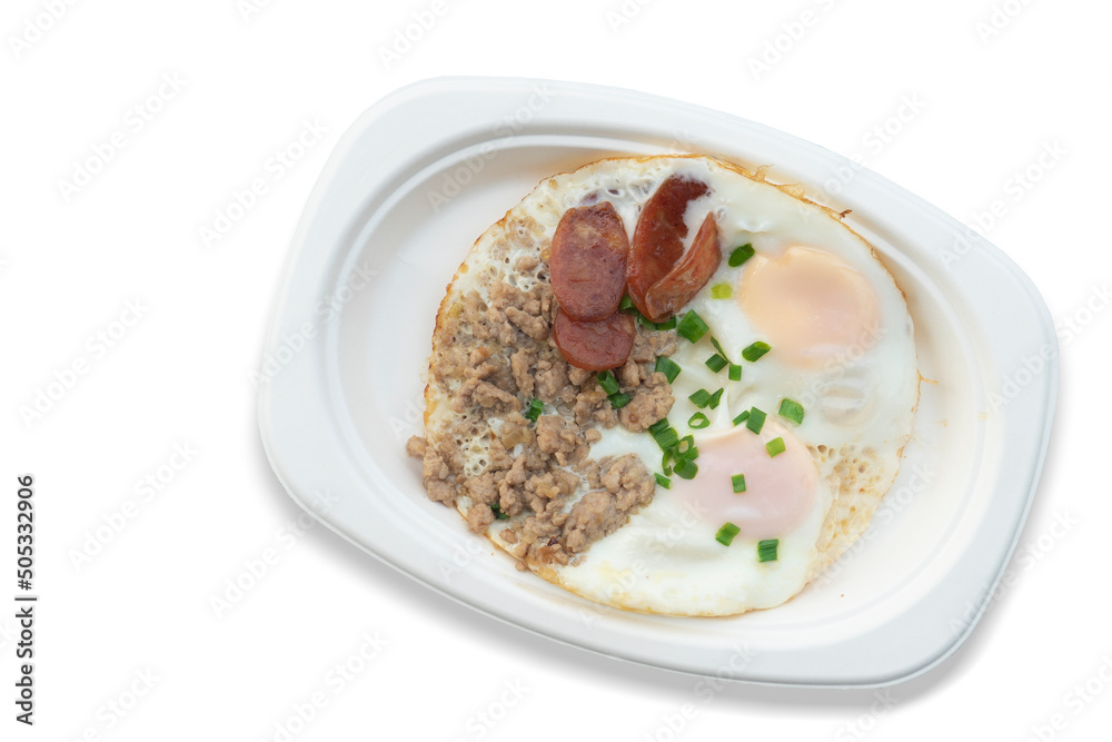 Indochina pan-fried egg with toppings in my homemade. Arrange on a white paper plate. On isolated white background with clipping path. Indochina pan-fried egg with toppings in my homemade. Arrange on a white paper plate. On isolated white background with clipping path.