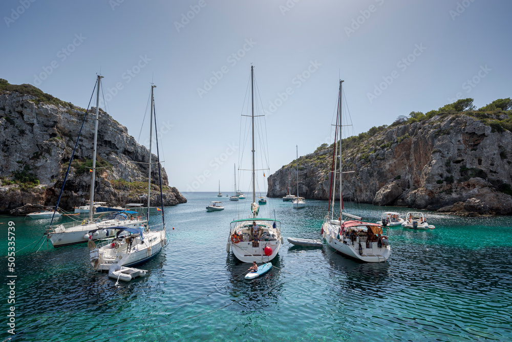 Φωτογραφία Sailing boats anchored in Cales Coves, a famous cove in the municipality of Alai