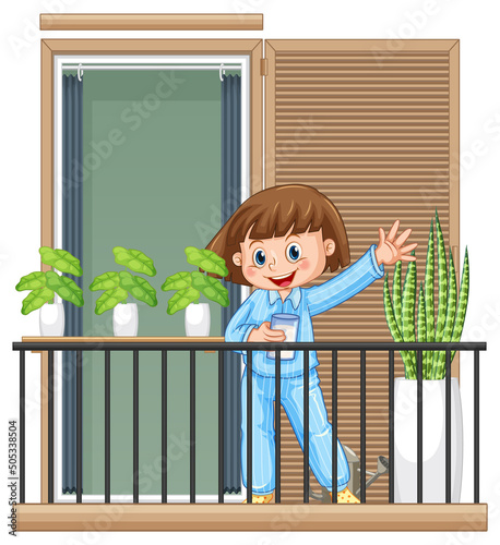 A happy girl standing on the balcony