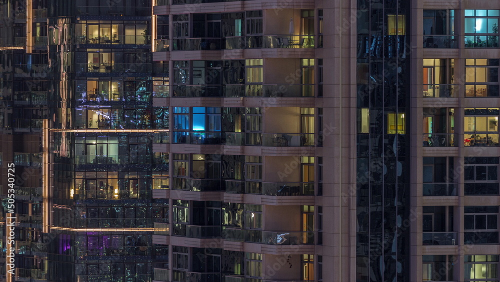 Windows of apartment buildings at night timelapse, the light from the windows of houses Windows of apartment buildings at night timelapse, the light from the windows of houses