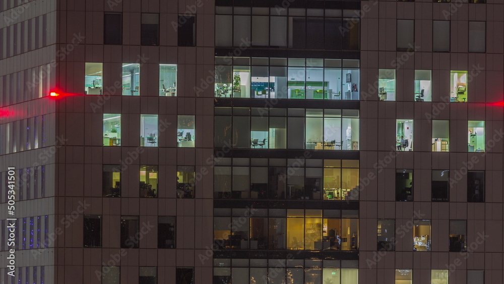 Windows of office buildings at night timelapse, the light from the windows of houses Windows of office buildings at night timelapse, the light from the windows of houses