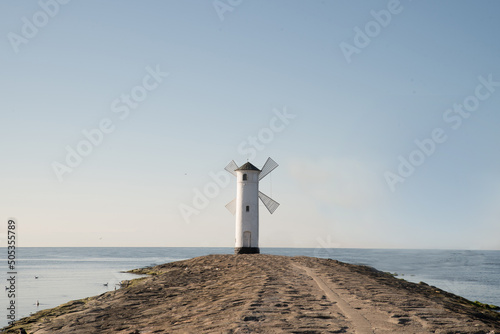 Scenic view of the old mill lighthouse at sunrise. Swinoujscie. Poland.lighthouse mill