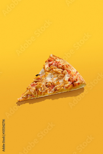 Slice of pizza over bright color background