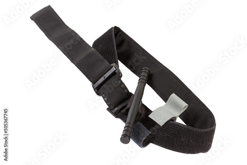 Deployed tourniquet for combat use on a white background