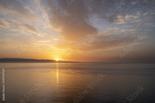 Fototapeta Naklejka Na Ścianę i Meble -  Sunset over the sea. Sicily, Italy.