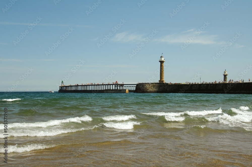 lighthouse on the beach,British seaside town of Whitby