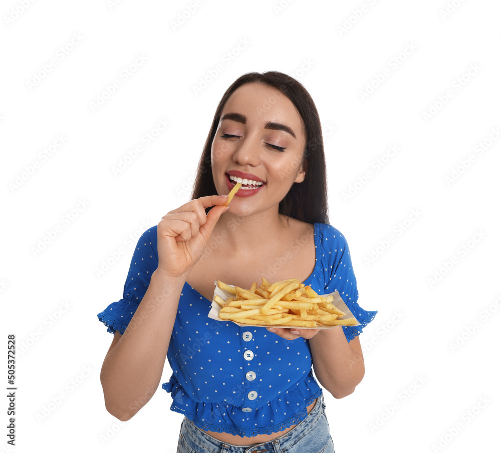 Beautiful young woman eating French fries on white background Beautiful young woman eating French fries on white background