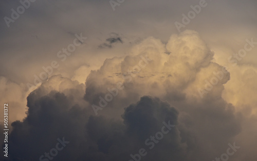 Dramatic sky clouds in shadow background