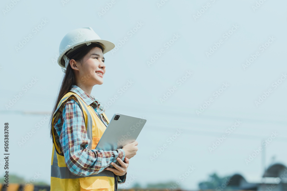 Engineer black woman standing on a construction site for portraits in a happy mood