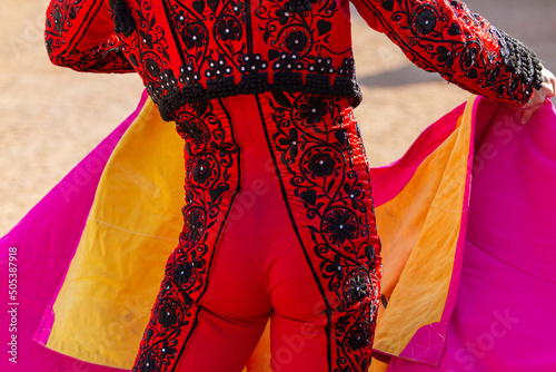 typical bullfighter costume in a bullfight photo