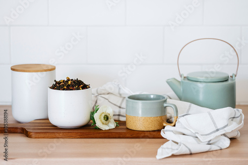 Ceylon tea in mug and jars with kettle