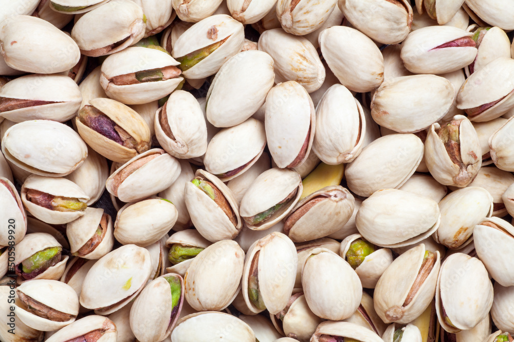 Background of fresh salted pistachio nuts