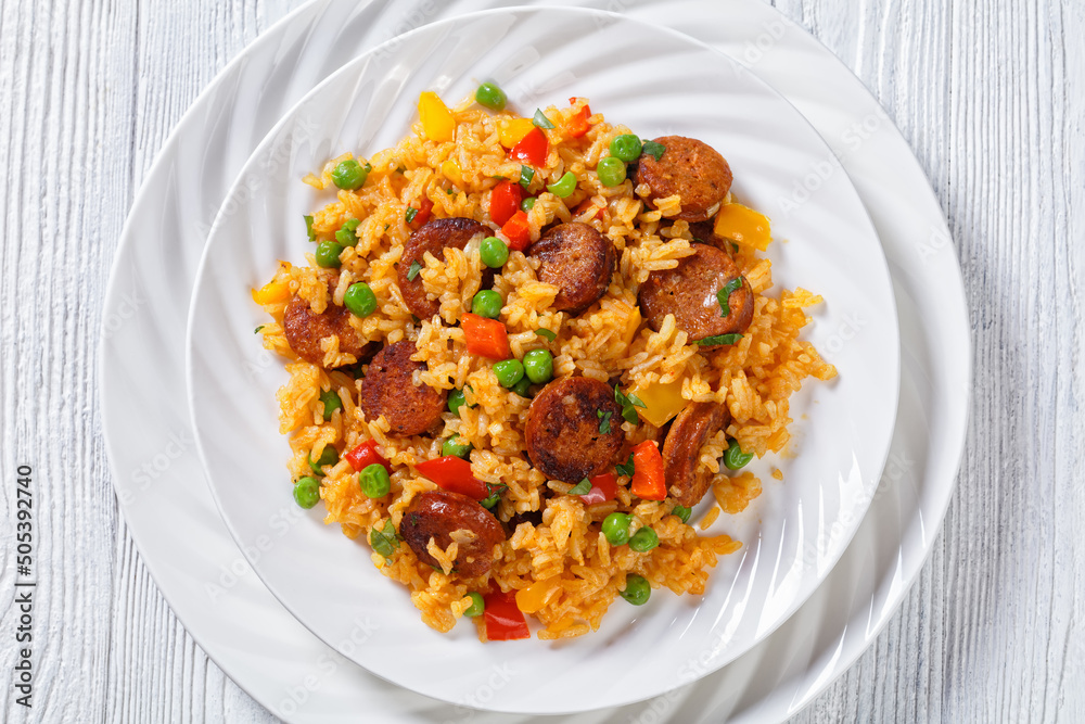 smoked sausages with rice and vegetables, top view smoked sausages with rice and vegetables, top view