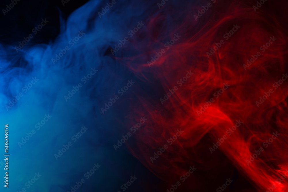 Fototapeta premium Blue steam on a black background.