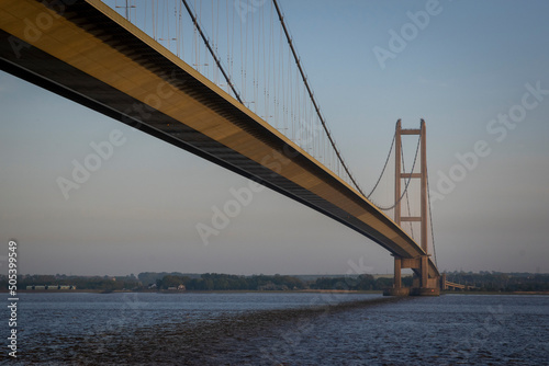 the Humber bridge crossing the river Humber during sunset