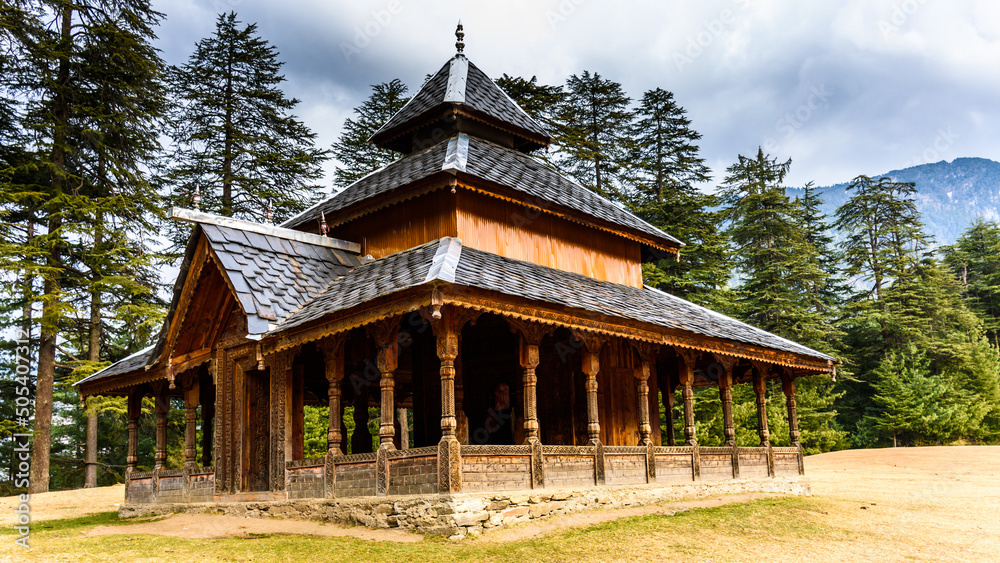 Shangchul mahadev temple in the meadow of Shahgarh, surrounded by Deodar Tree and Himalayas mountains in Sainj Valley, Great Himalayan National Park, Himachal Pradesh, India Shangchul mahadev temple in the meadow of Shahgarh, surrounded by Deodar Tree and Himalayas mountains in Sainj Valley, Great Himalayan National Park, Himachal Pradesh, India