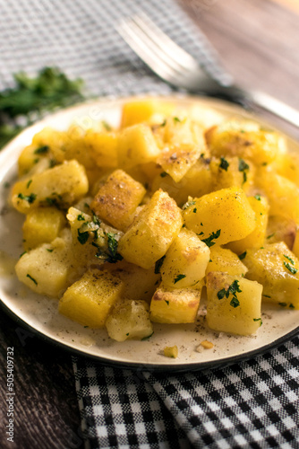 closeup of freshly baked potato on the plate