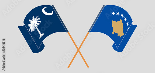 Crossed and waving flags of The State of South Carolina and Kosovo
