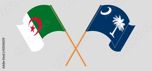 Crossed and waving flags of Algeria and The State of South Carolina