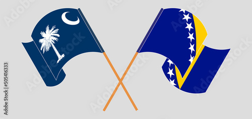 Crossed and waving flags of The State of South Carolina and Bosnia and Herzegovina