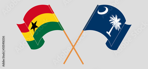 Crossed and waving flags of Ghana and The State of South Carolina