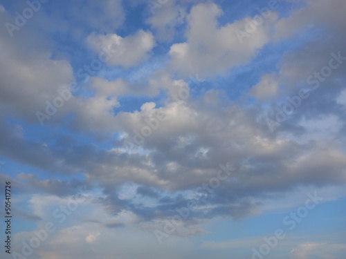 Fototapeta Naklejka Na Ścianę i Meble -  stratocumulus cloud with blue sky shining sun from the top