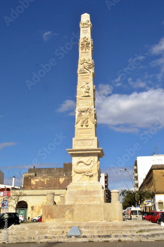 The Obelisco in honour of Ferdinand I of the Two Sicilies in Lecce, Italy photo
