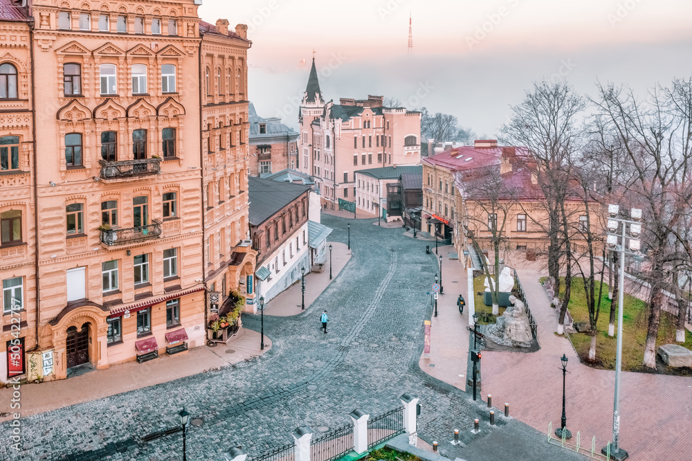 Aerial view of Andriyivskyy Descent, Richard the Lionheart Castle and soft morning fog in Kyiv, Ukraine. Concept, travel, tourism