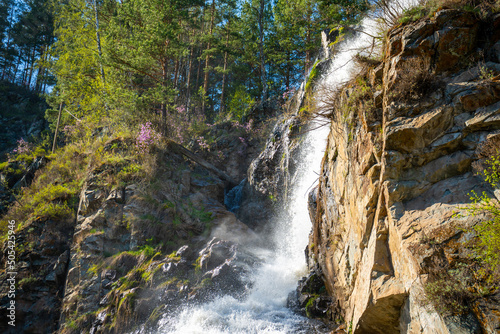 Kamysh waterfall at sunset light  spring time in the Altai Republic  Siberia  Russia