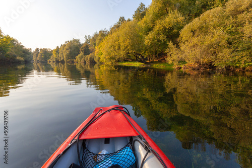 Paddling in the afternoon on the Dobra River in Croatia photo