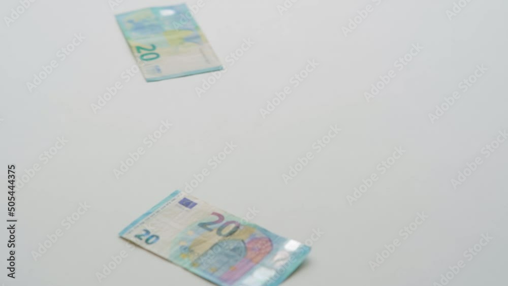 Money falling on a table. Economics and finance. Slow motion Money falling on a table. Economics and finance. Slow motion